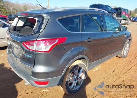 2016 Ford Escape Titanium z USA, uszkodzony, nr VIN 1FMCU0J92GUB43545